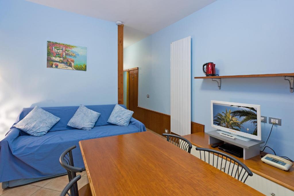 TV a/nebo společenská místnost v ubytování Residence Dei Due Porti