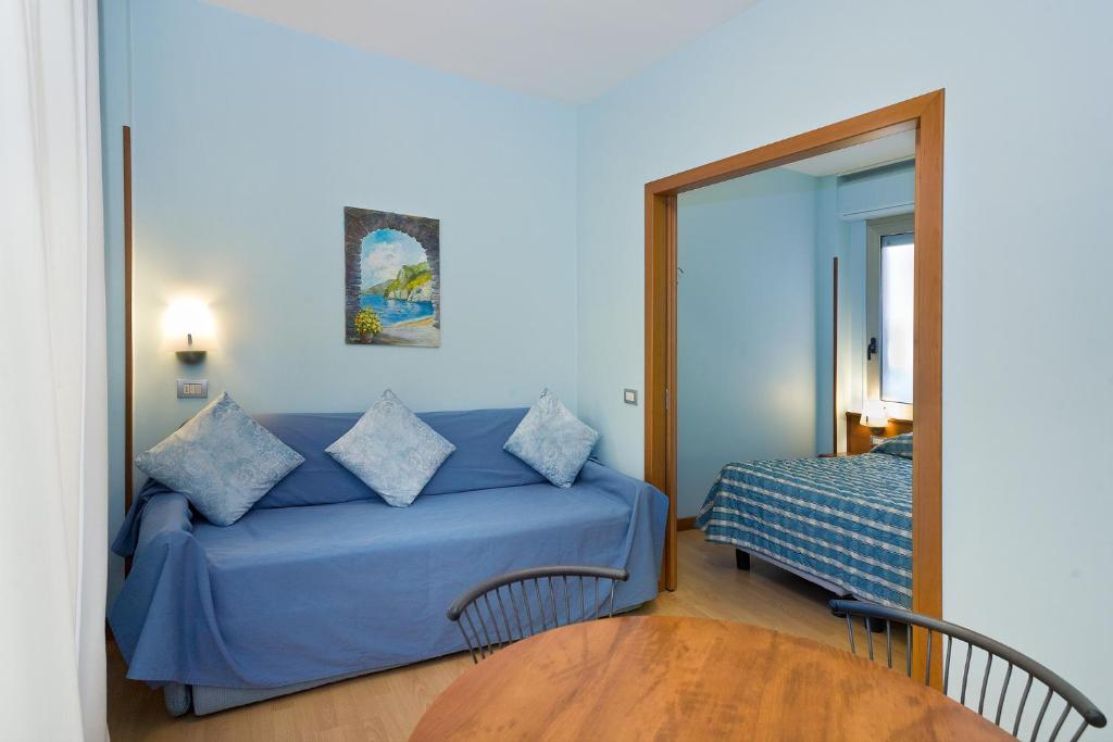 Postel nebo postele na pokoji v ubytování Residence Dei Due Porti