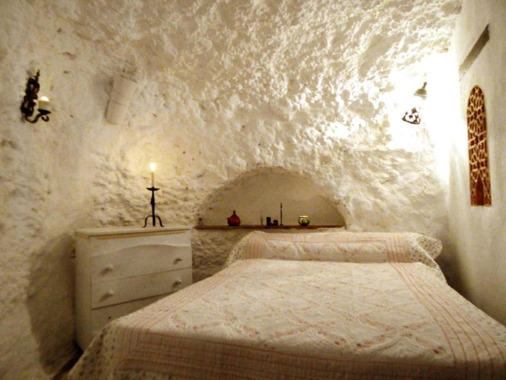 Posteľ alebo postele v izbe v ubytovaní La Constanza Casa Cueva