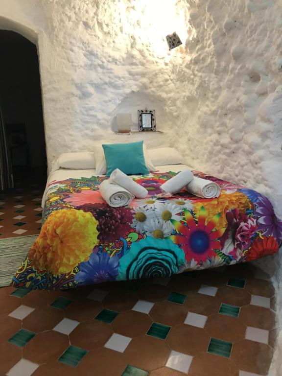 Posteľ alebo postele v izbe v ubytovaní La Constanza Casa Cueva