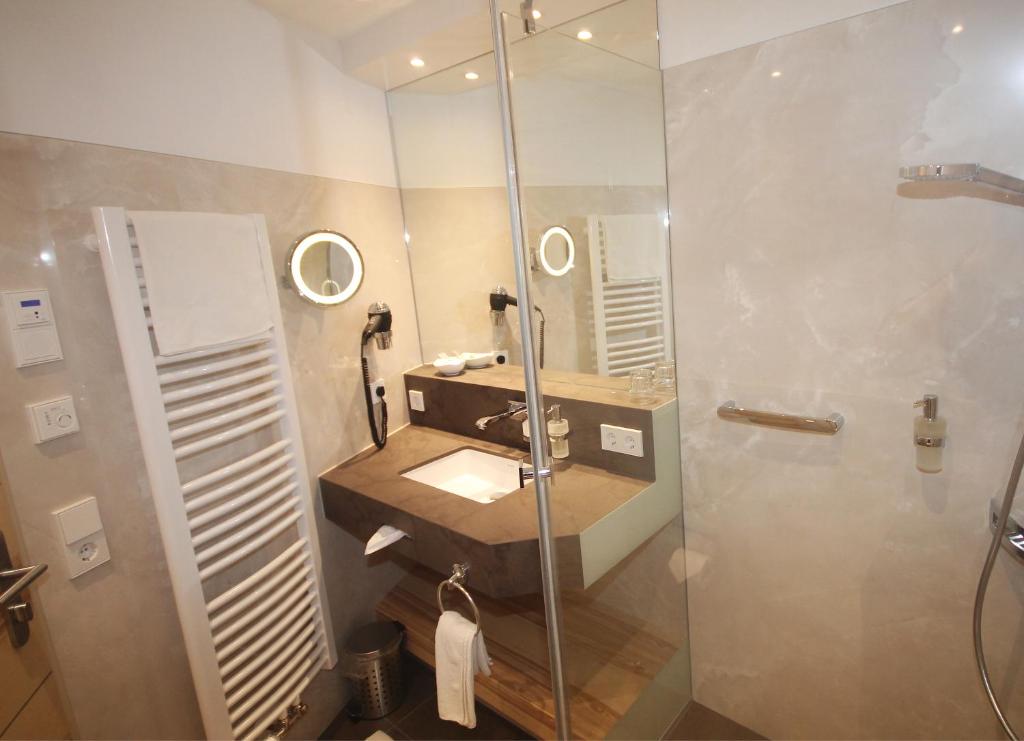 Koupelna v ubytování Wohlfühlhotel Bercher
