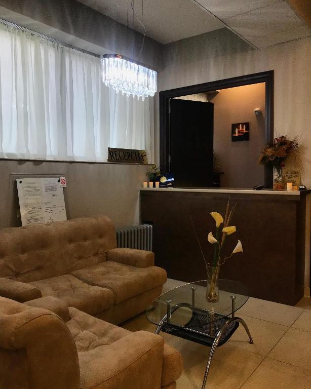 Posezení v ubytování Golden Inn Hotel