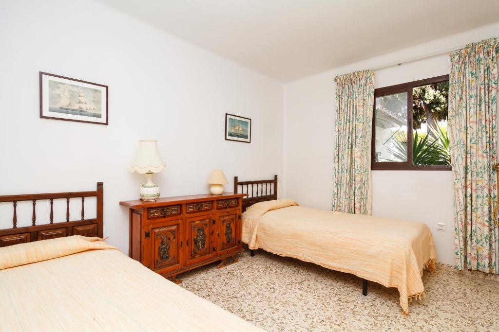Posteľ alebo postele v izbe v ubytovaní Capistrano Playa 803 Casasol
