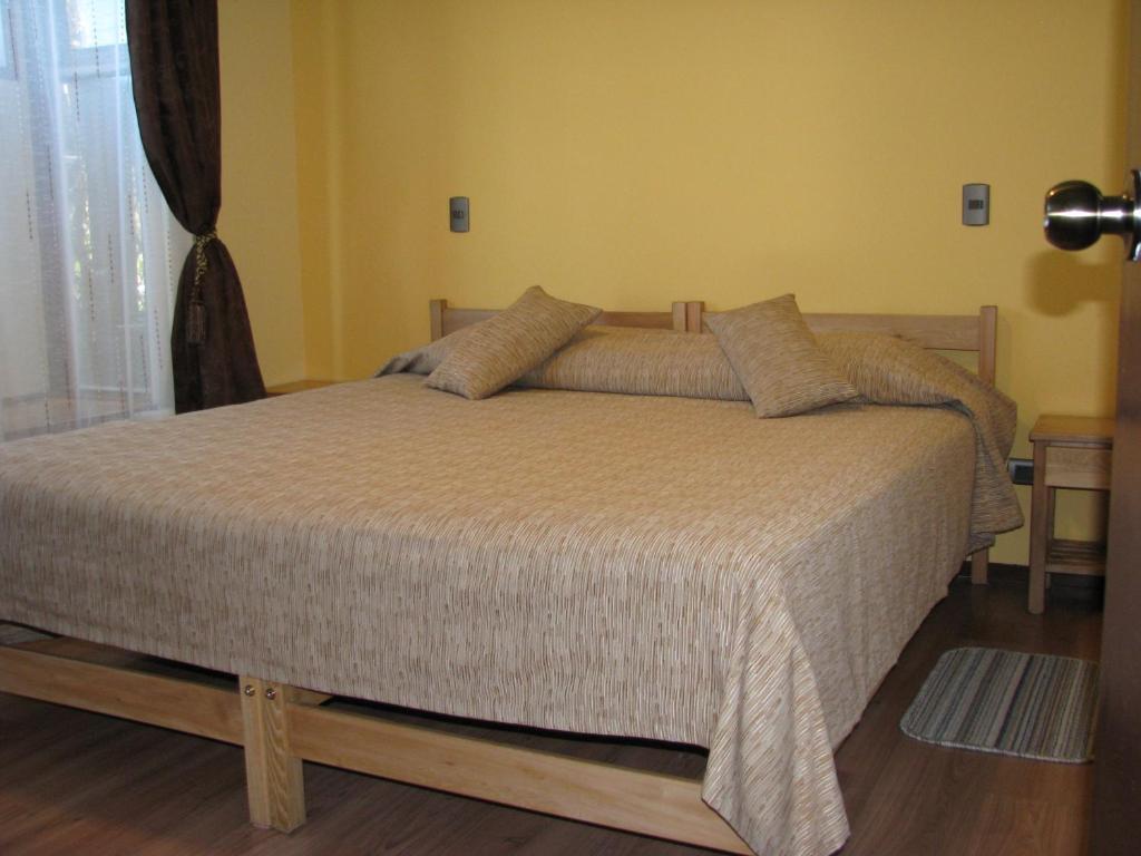 Кровать или кровати в номере Portal Austral