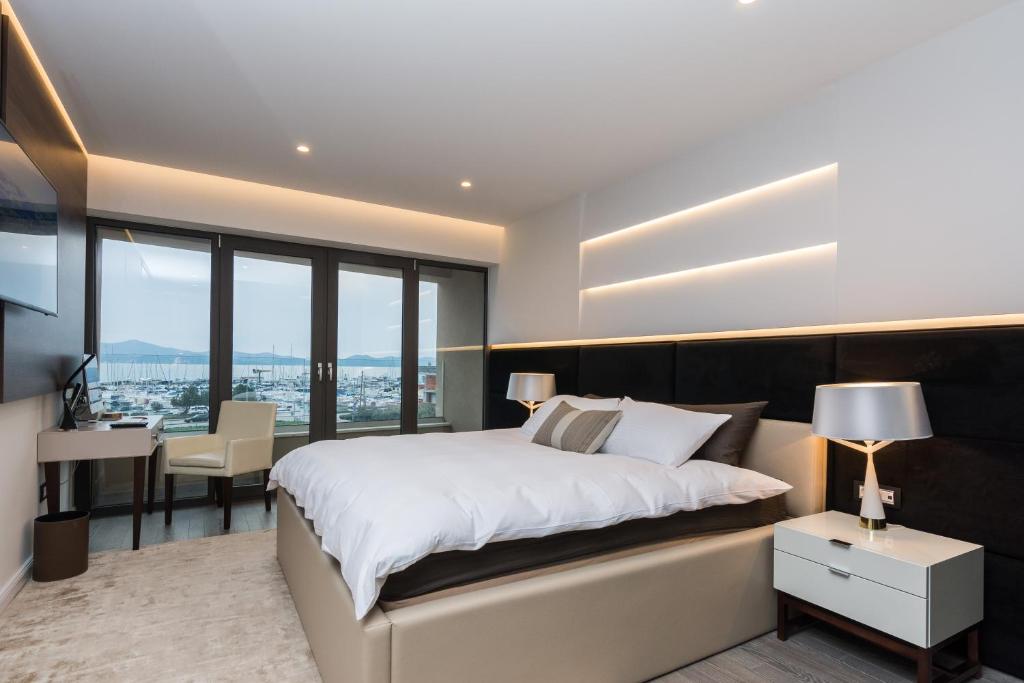 Łóżko lub łóżka w pokoju w obiekcie Luxury Apartment Kortina