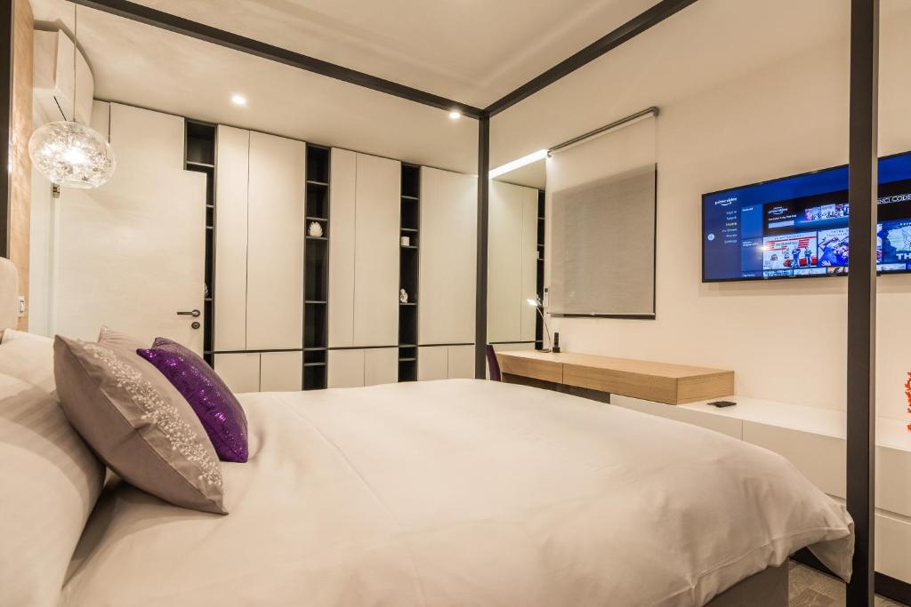 Łóżko lub łóżka w pokoju w obiekcie Luxury Apartment Kortina