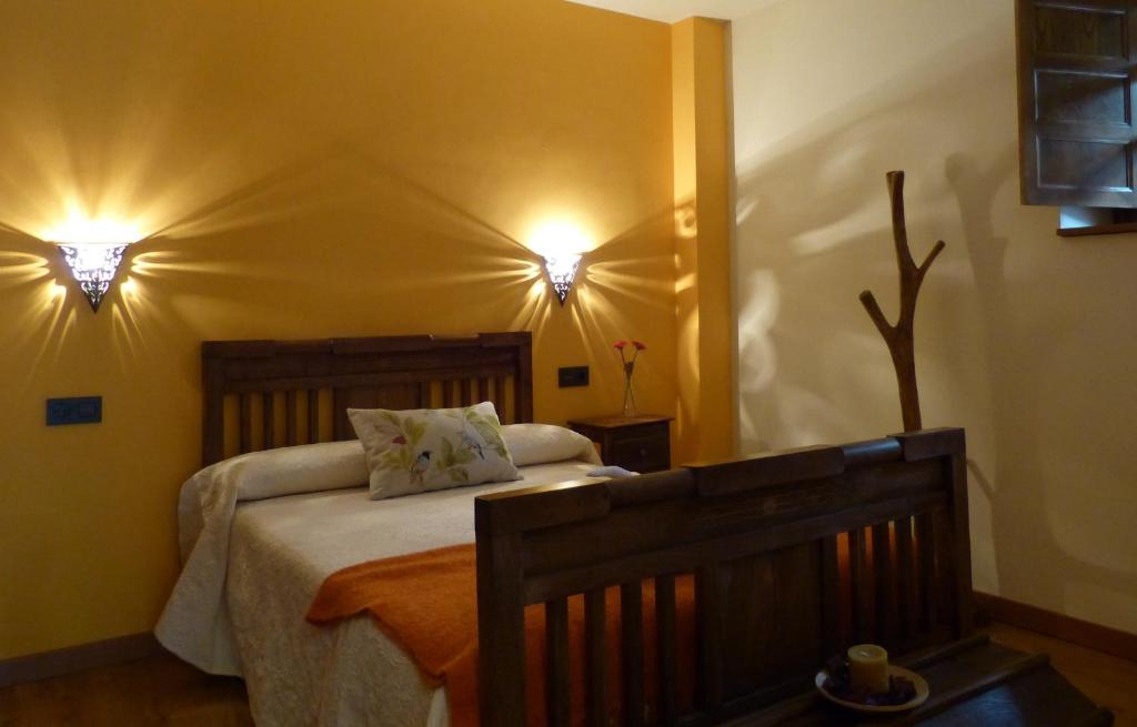 Postel nebo postele na pokoji v ubytování Apartamentos El Valledor