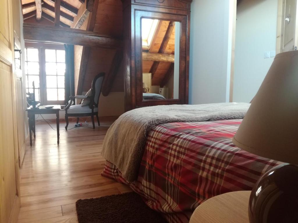 Postel nebo postele na pokoji v ubytování chambres et table d'hôtes du Péré