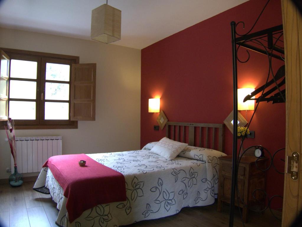 Postel nebo postele na pokoji v ubytování Apartamentos El Valledor