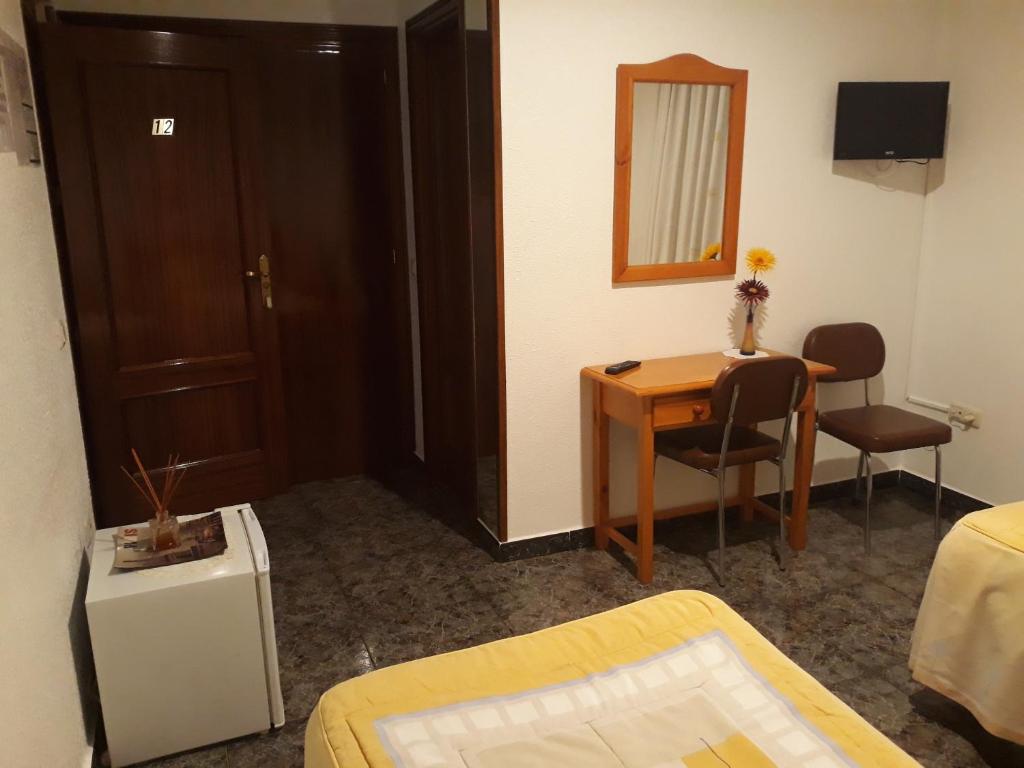 Postel nebo postele na pokoji v ubytování San Cristobal