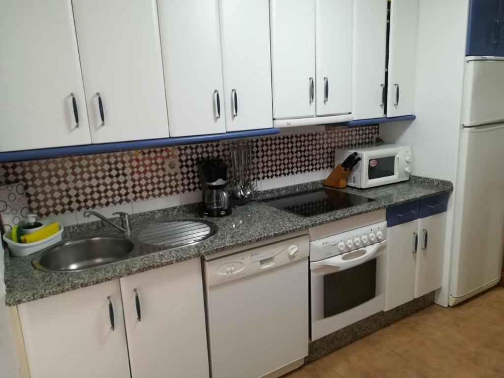 Kuchyň nebo kuchyňský kout v ubytování Sisos Place