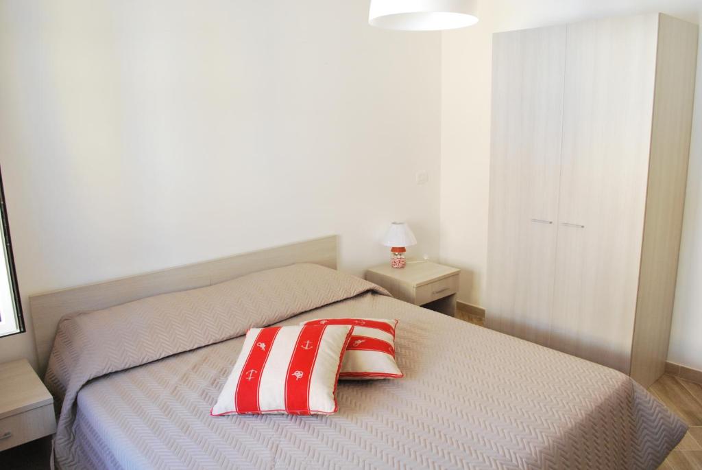 Postel nebo postele na pokoji v ubytování B&B Mare e Templi