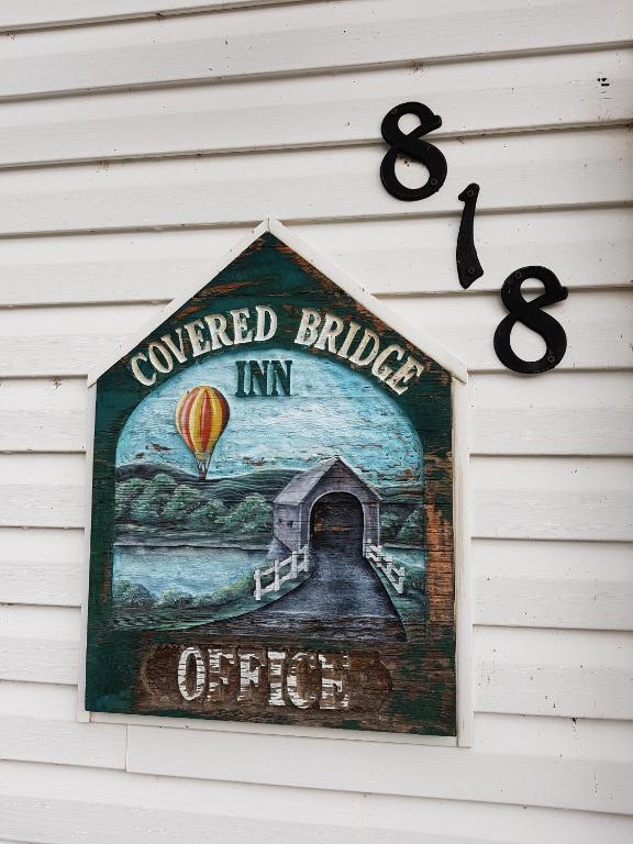 Certifikát, hodnocení, plakát nebo jiný dokument vystavený v ubytování Covered Bridge Inn & Suites
