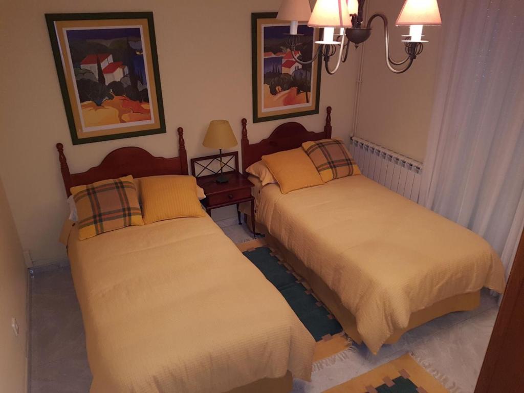 Postelja oz. postelje v sobi nastanitve Apartamento Sanxenxo - Playa Areas