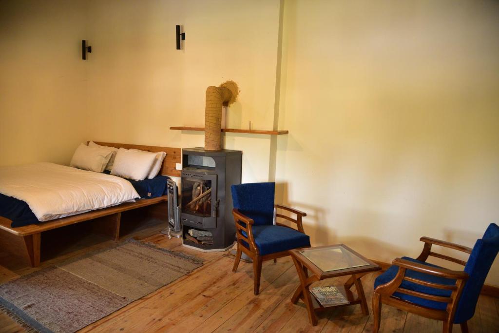 Postel nebo postele na pokoji v ubytování Deodar Homestay
