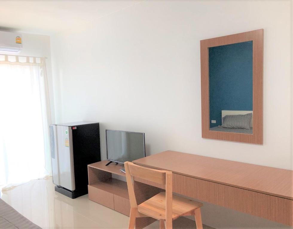 TV a/nebo společenská místnost v ubytování H12, The Stylish Apartment