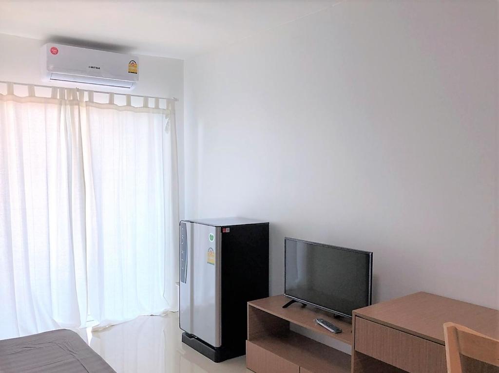 TV a/nebo společenská místnost v ubytování H12, The Stylish Apartment