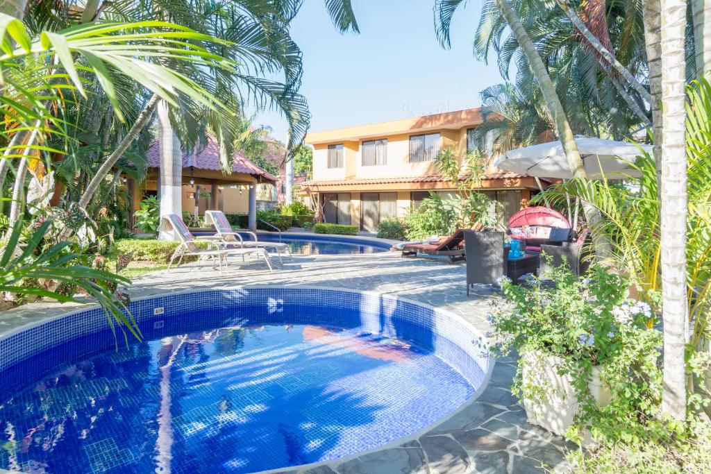 Bazén v ubytování Green Villas El Coco nebo v jeho okolí