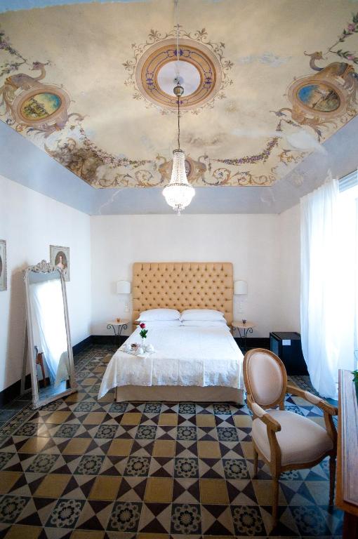 Postel nebo postele na pokoji v ubytování Sveva rooms
