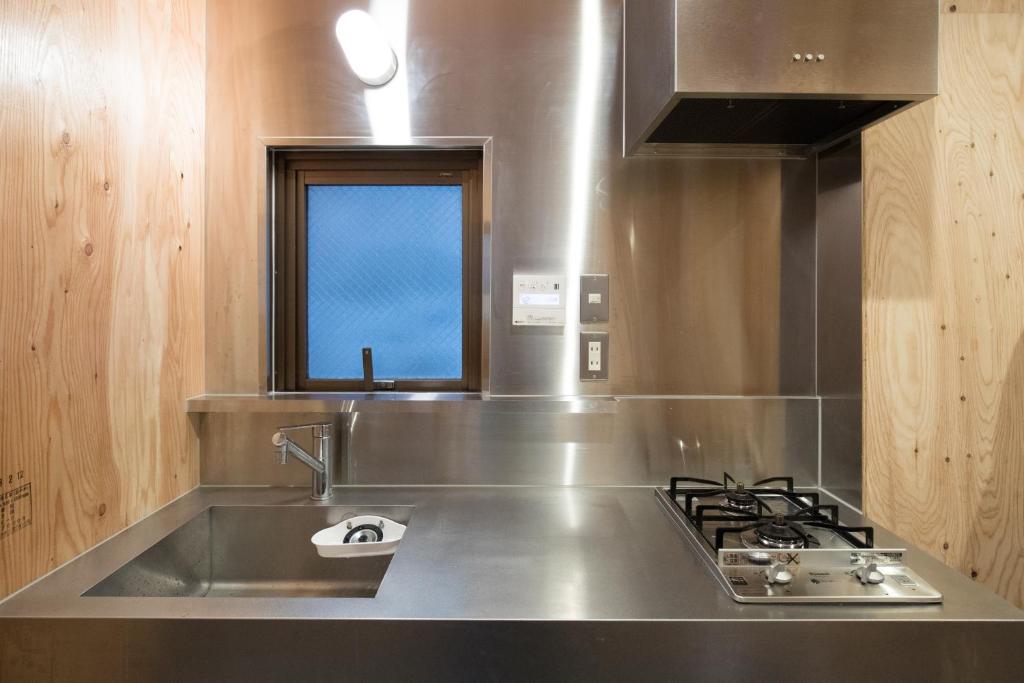 Kuchyň nebo kuchyňský kout v ubytování Vacation"Ninja"house Secretbase near Asakusa