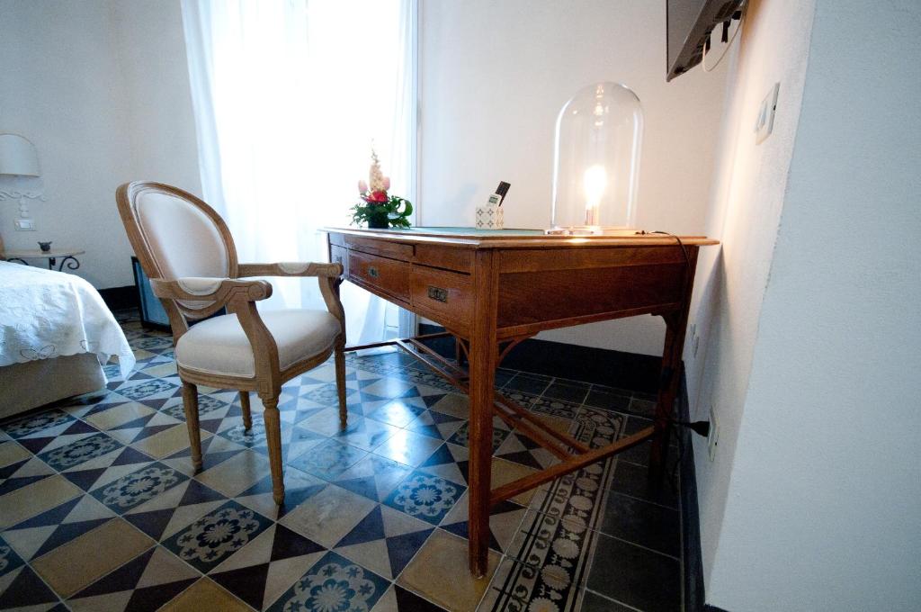 Postel nebo postele na pokoji v ubytování Sveva rooms