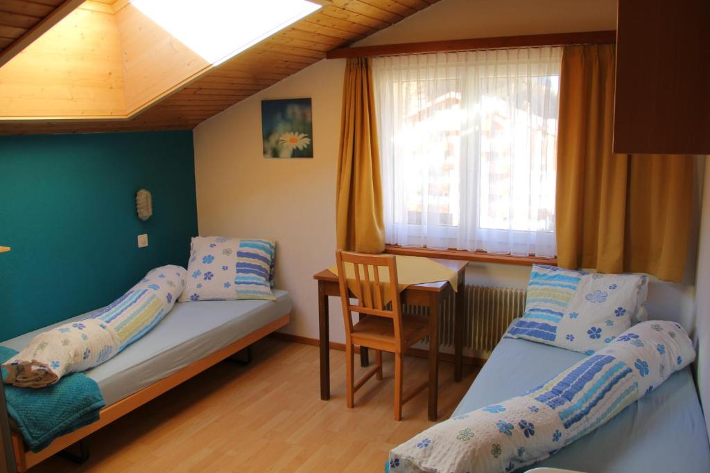 Postel nebo postele na pokoji v ubytování Pension Heino