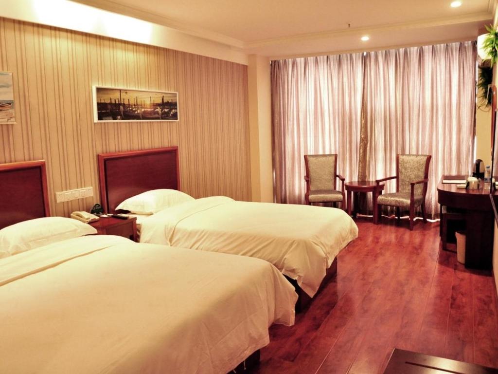 Vuode tai vuoteita majoituspaikassa GreenTree Inn Anhui Hefei Huangshan Road Business Hotel