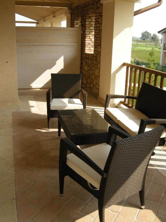 Balkon lub taras w obiekcie Garda Residence San Vigilio Golf