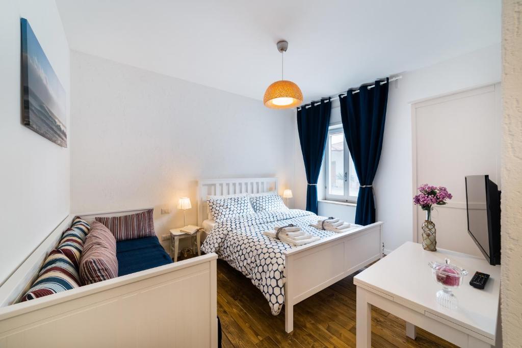 Postel nebo postele na pokoji v ubytování White Rooms