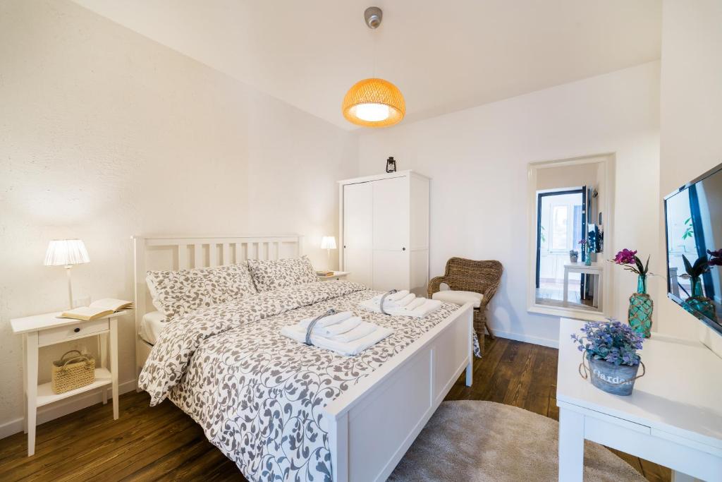 Postel nebo postele na pokoji v ubytování White Rooms