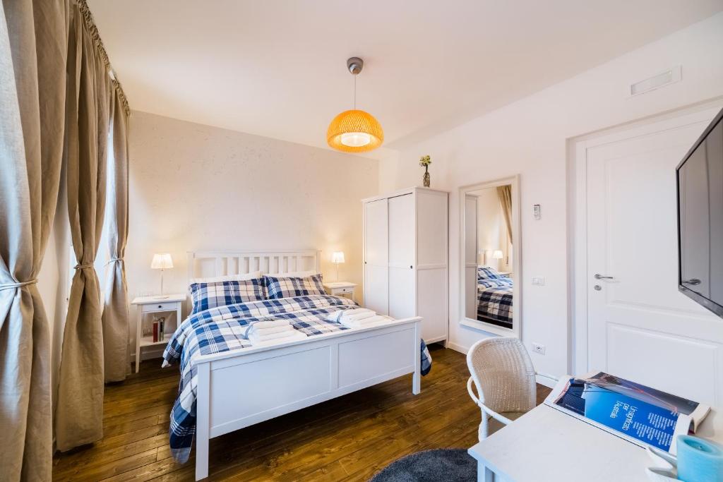 Postel nebo postele na pokoji v ubytování White Rooms