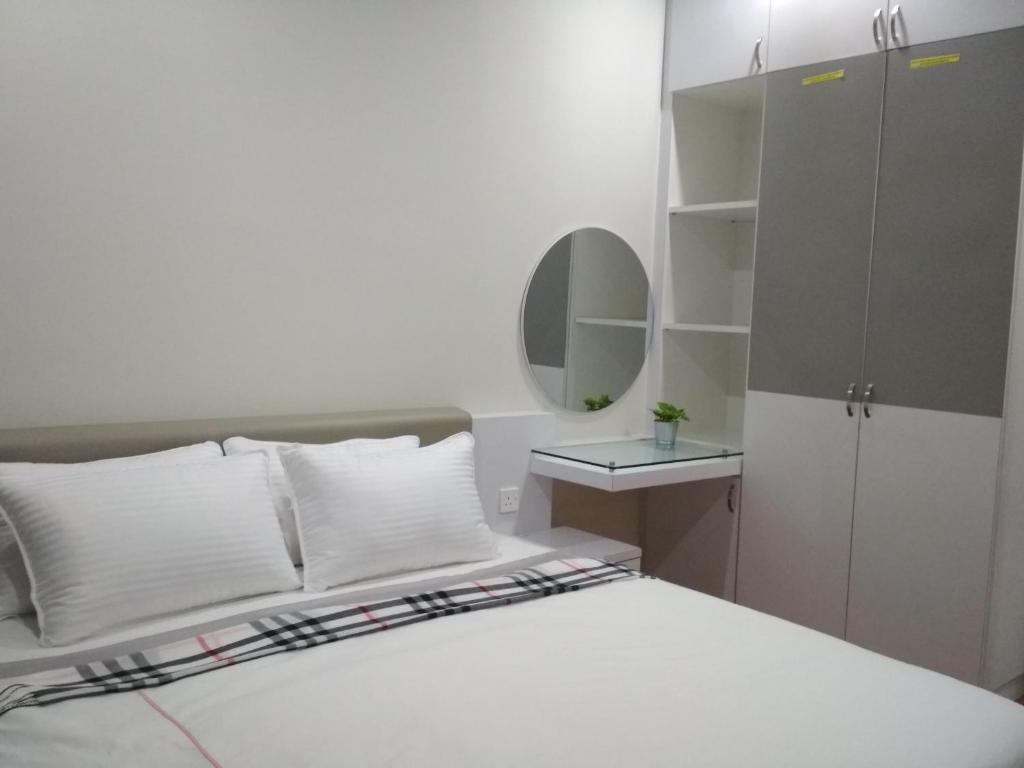 Katil atau katil-katil dalam bilik di Soho Suites KLCC by Elite