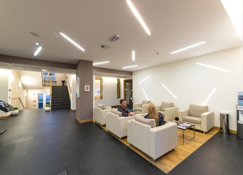 Posezení v ubytování Hotel-Résidence Am Klouschter