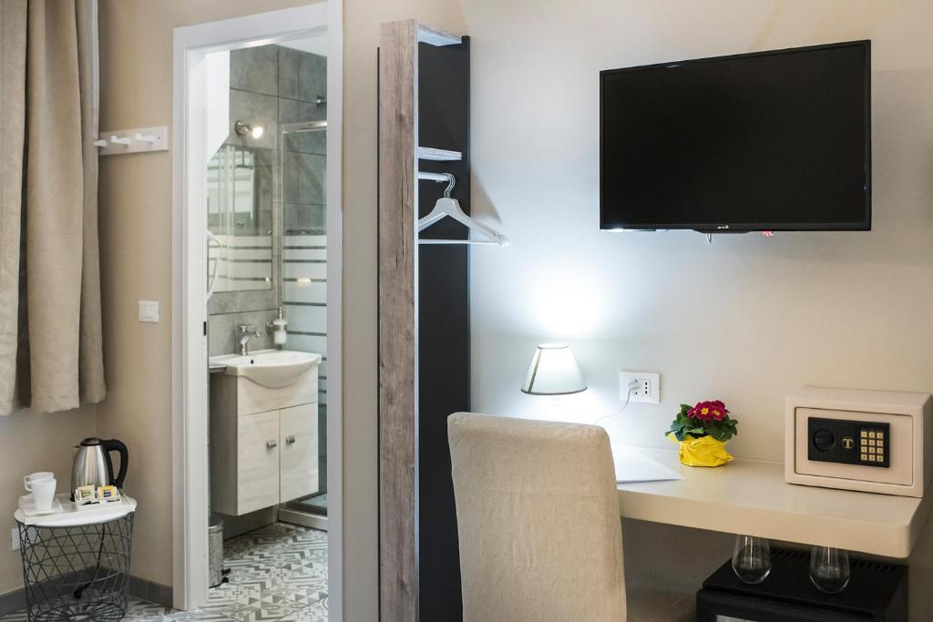 TV a/nebo společenská místnost v ubytování TOHOUSE Rooms