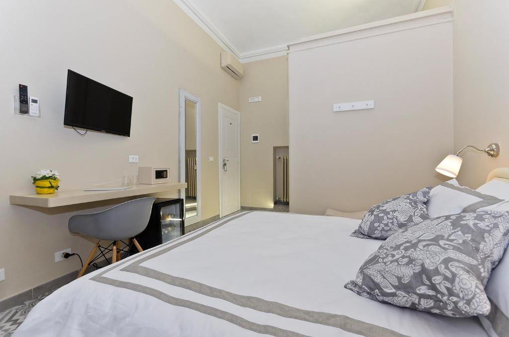 Postel nebo postele na pokoji v ubytování TOHOUSE Rooms
