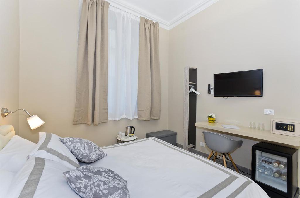 Postel nebo postele na pokoji v ubytování TOHOUSE Rooms