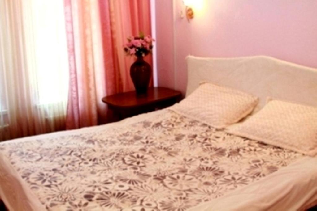 Postel nebo postele na pokoji v ubytování Edem Hotel