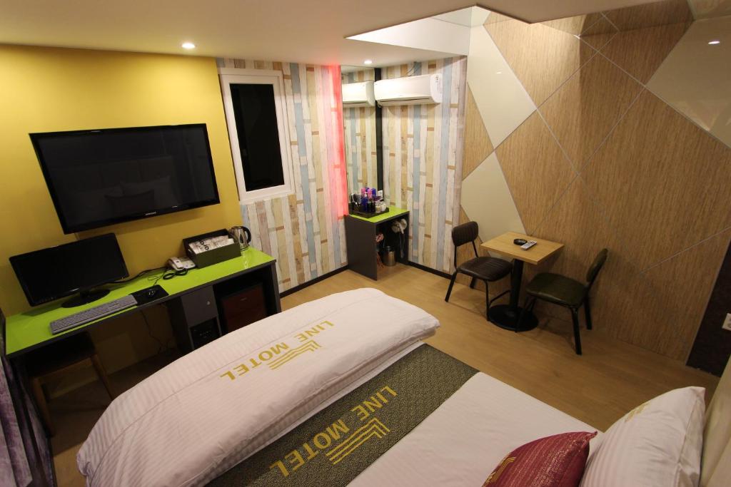 Postel nebo postele na pokoji v ubytování Line Motel