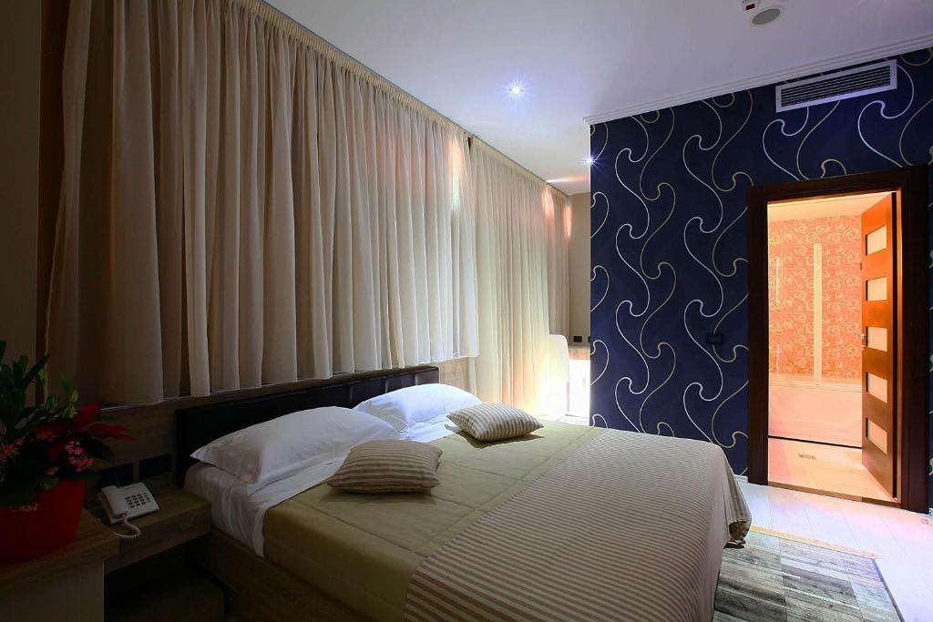 Postel nebo postele na pokoji v ubytování Hotel Partner & SPA