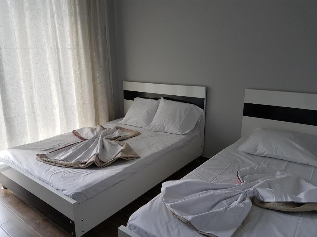Postel nebo postele na pokoji v ubytování Royal House