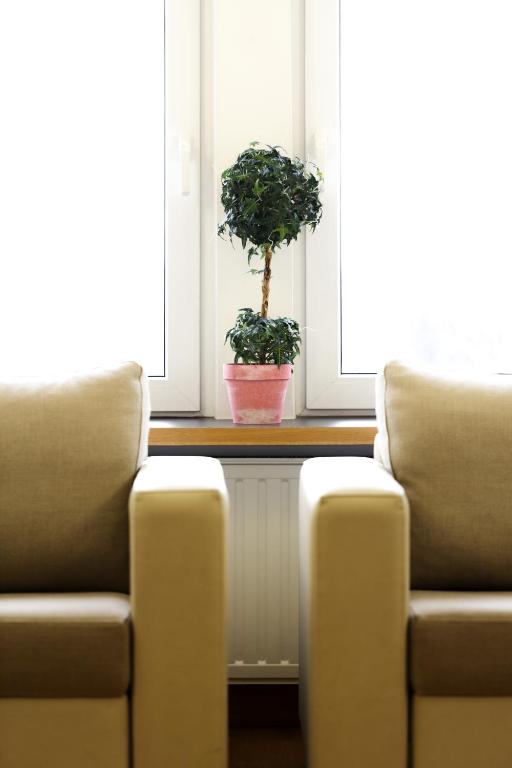 Posezení v ubytování Hotel-Résidence Am Klouschter