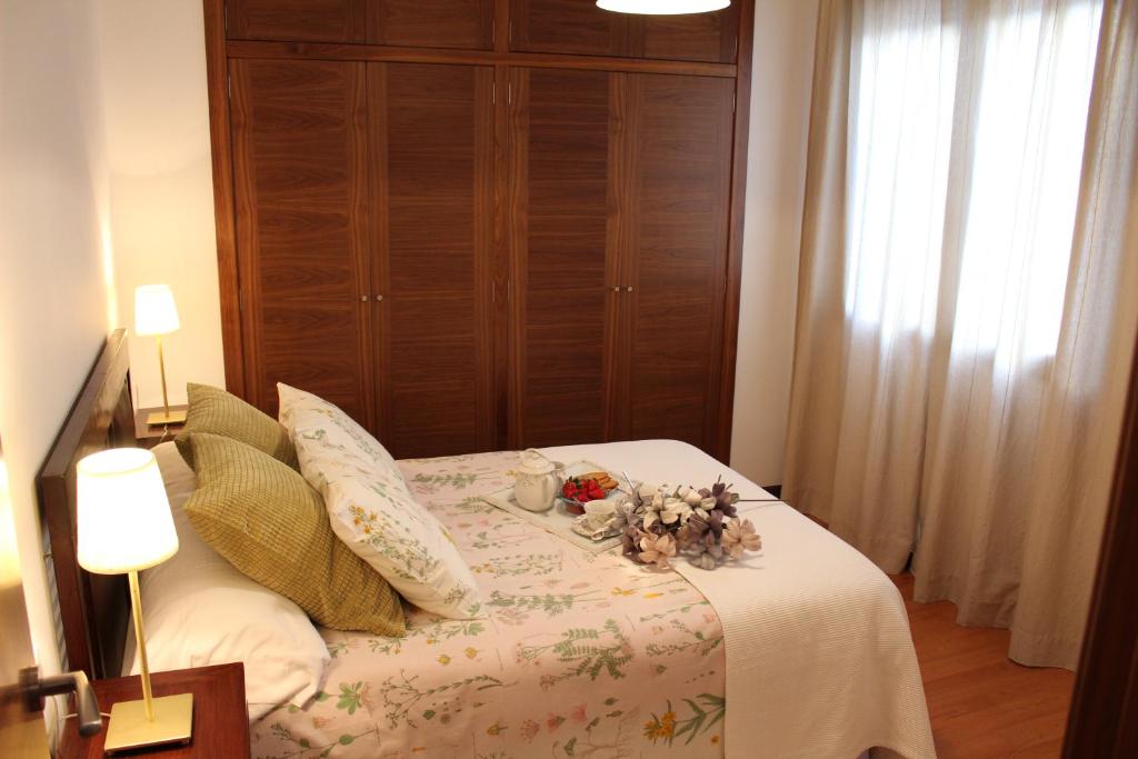 Posteľ alebo postele v izbe v ubytovaní Apartamentos Balcón de la Vega