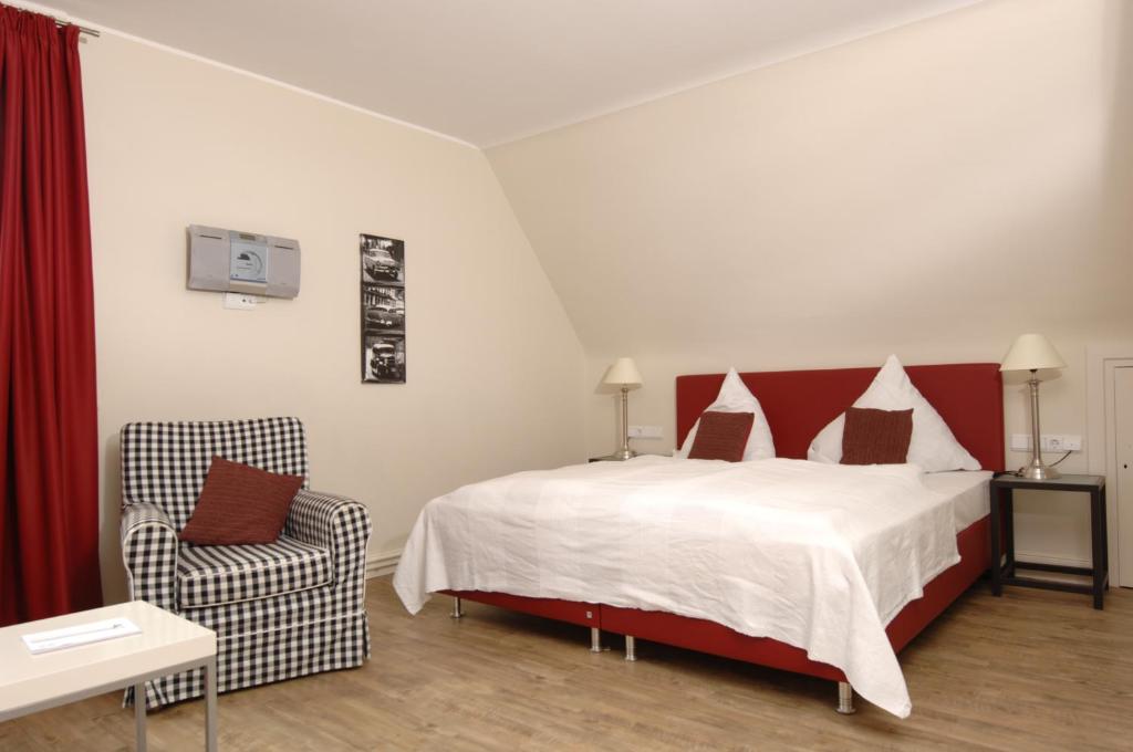 Postel nebo postele na pokoji v ubytování Hotel Alster Au