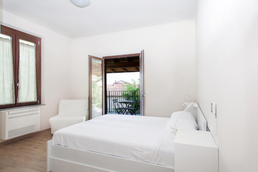 Postel nebo postele na pokoji v ubytování Agriturismo Vignarello