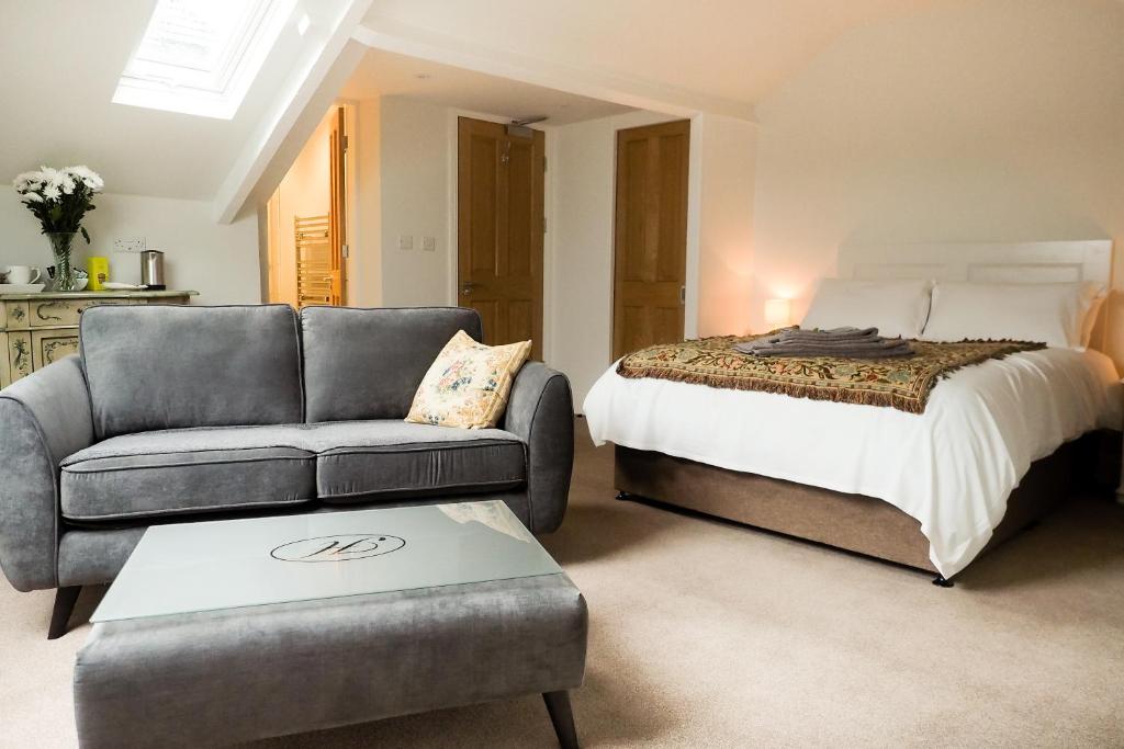 Un pat sau paturi într-o cameră la The Horngarth