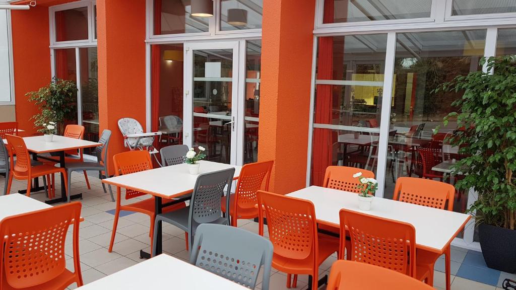 Restaurace v ubytování The Originals Access, Hôtel les Iris, Berck-sur-Mer