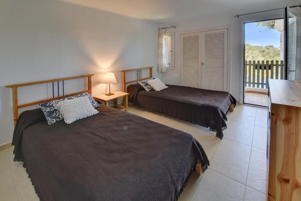 Postel nebo postele na pokoji v ubytování Apartamento Ferrera Park 206