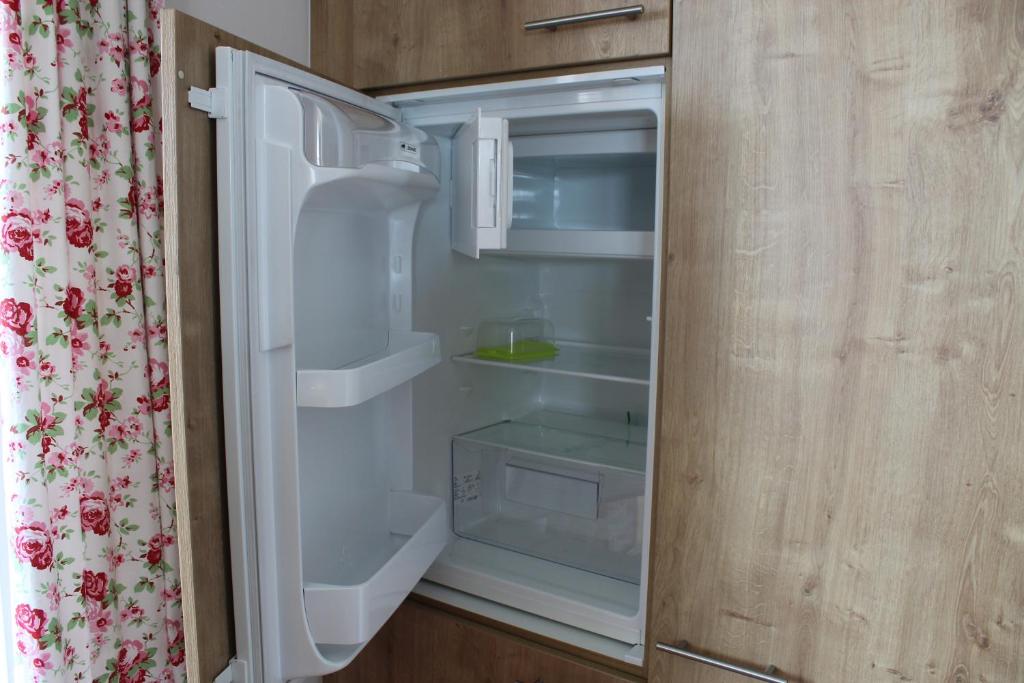 Kuchyň nebo kuchyňský kout v ubytování Apartment Nest