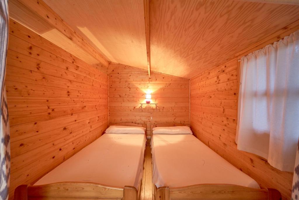 Postel nebo postele na pokoji v ubytování Camping Escana