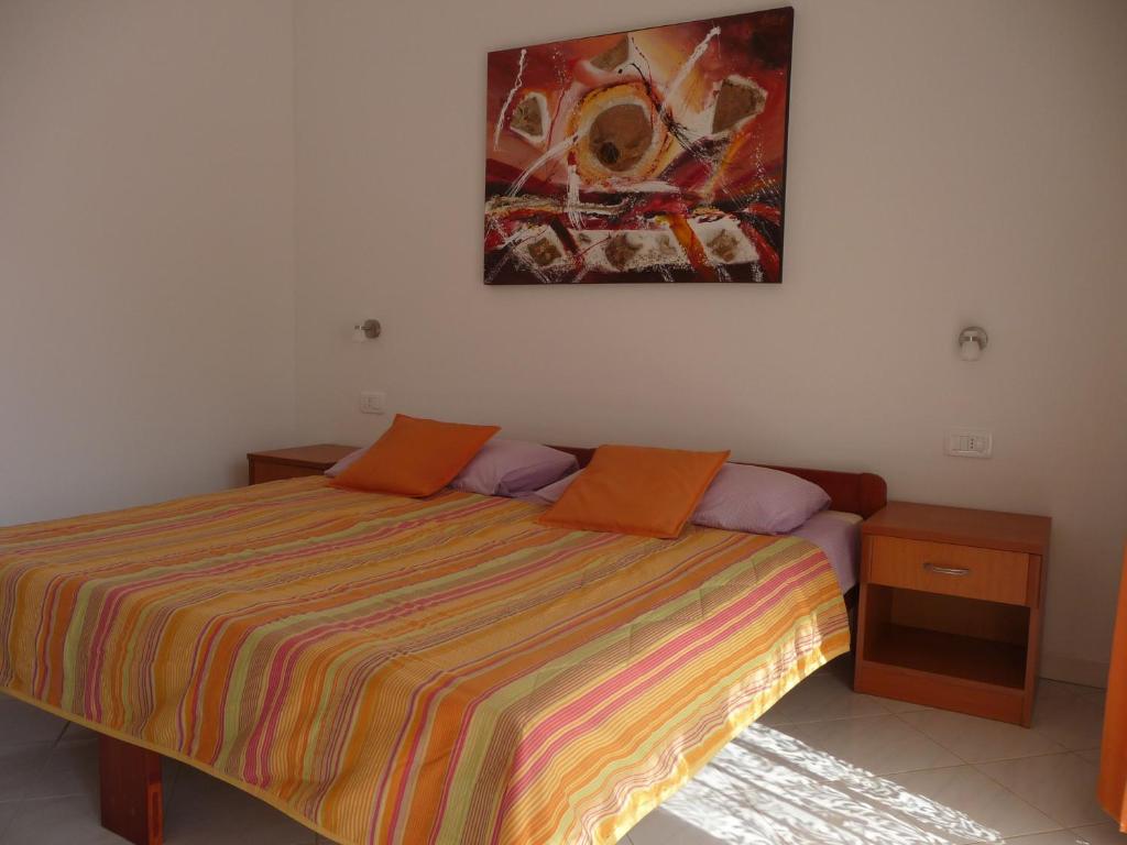 Postel nebo postele na pokoji v ubytování Apartments & Rooms Milka